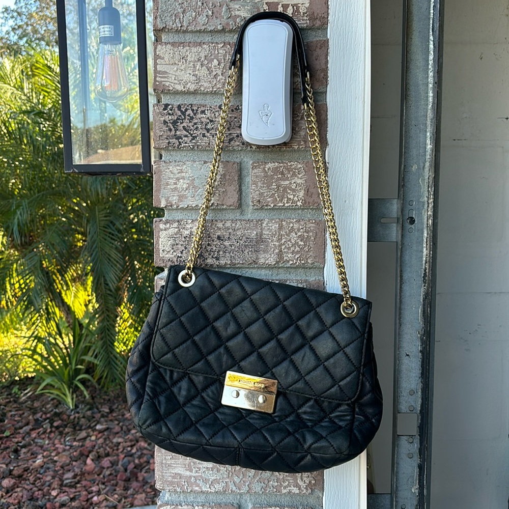 Michael Kors Bag with Gold Strap..